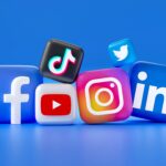 Social media icons for Facebook, Youtube, Instagram, Twitter, LinkedIn and TikTok.